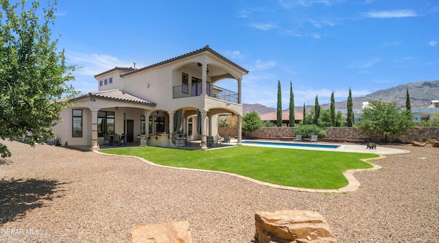 6572 Tuscany Ridge Dr, El Paso, TX 79912 - rear view of property with a balcony, a tiled roof, a patio, and a mountain view