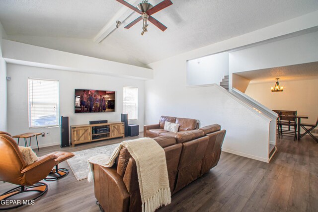 7573 Le Conte Dr Unit A, El Paso, TX 79912 - living room featuring dark wood-type flooring, stairway, a chandelier, ceiling fan, and baseboards