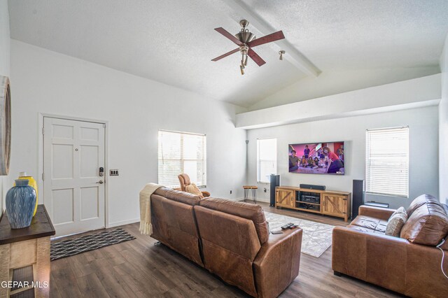7573 Le Conte Dr Unit A, El Paso, TX 79912 - living area with beamed ceiling, dark wood-style flooring, a textured ceiling, a ceiling fan, and high vaulted ceiling
