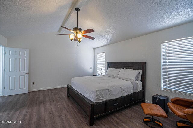 7573 Le Conte Dr Unit A, El Paso, TX 79912 - bedroom featuring dark wood finished floors, a textured ceiling, baseboards, and ceiling fan