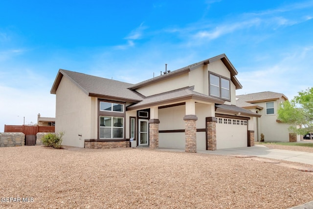 7101 Mesquite Tree Ln, El Paso, TX 79934 - view of front of property with stucco siding, driveway, stone siding, a garage, and a shingled roof