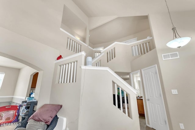 7101 Mesquite Tree Ln, El Paso, TX 79934 - stairs with a high ceiling and arched walkways
