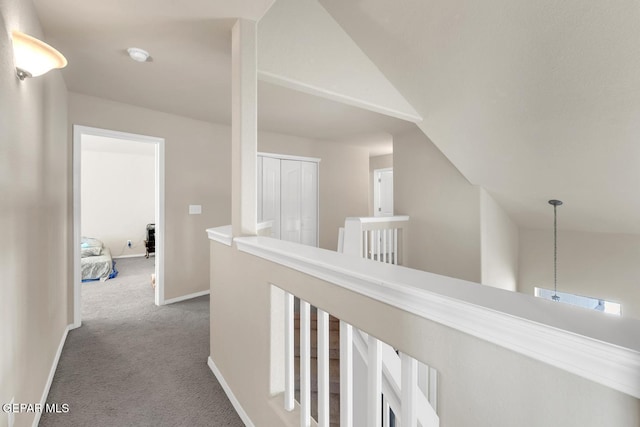 7101 Mesquite Tree Ln, El Paso, TX 79934 - hall with carpet, baseboards, and vaulted ceiling