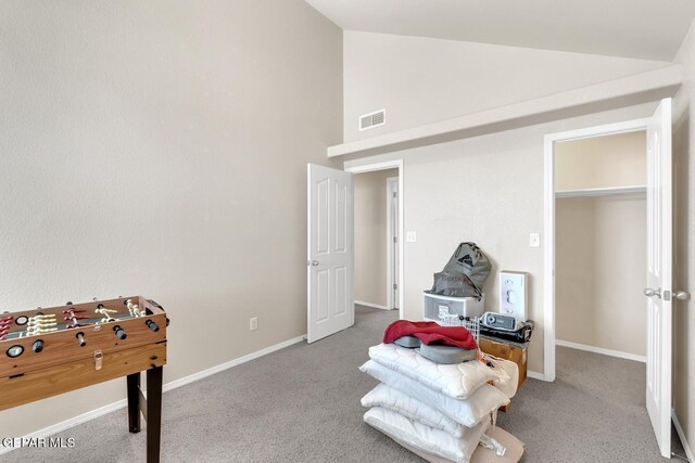7101 Mesquite Tree Ln, El Paso, TX 79934 - game room featuring carpet floors, baseboards, and high vaulted ceiling
