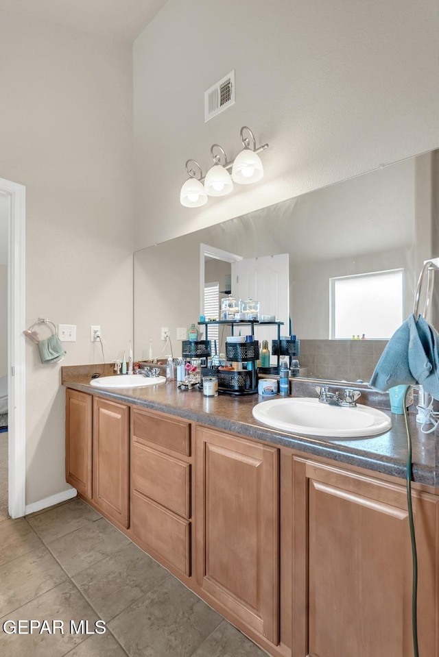 7101 Mesquite Tree Ln, El Paso, TX 79934 - bathroom featuring double vanity and tile patterned flooring
