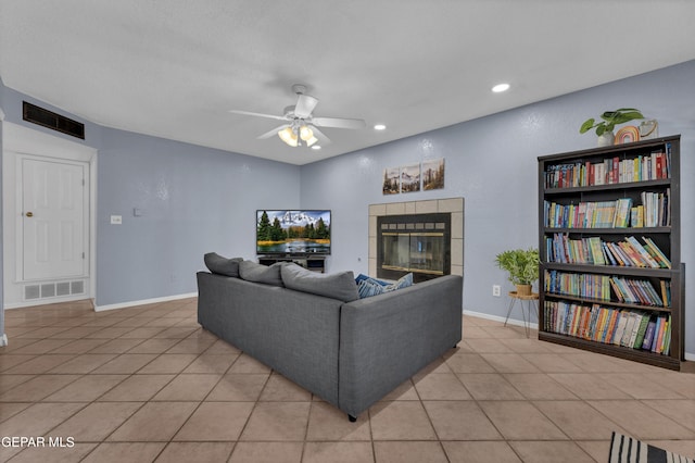 6101 Via Suerte Ave, El Paso, TX 79912 - living area featuring a fireplace, a ceiling fan, light tile patterned floors, recessed lighting, and baseboards