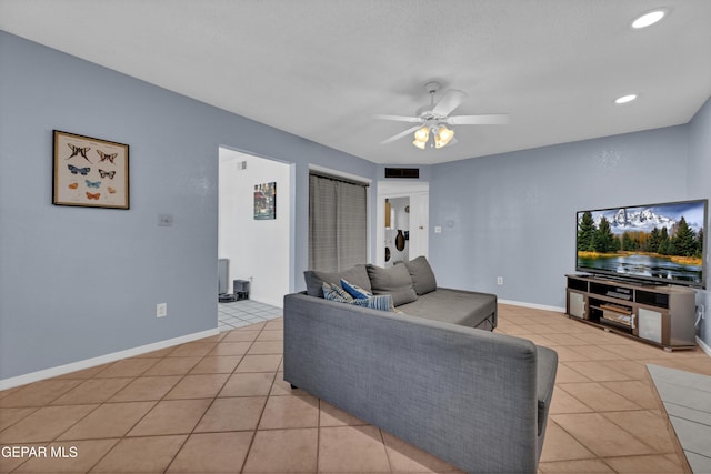 6101 Via Suerte Ave, El Paso, TX 79912 - living room with ceiling fan, light tile patterned floors, recessed lighting, and baseboards