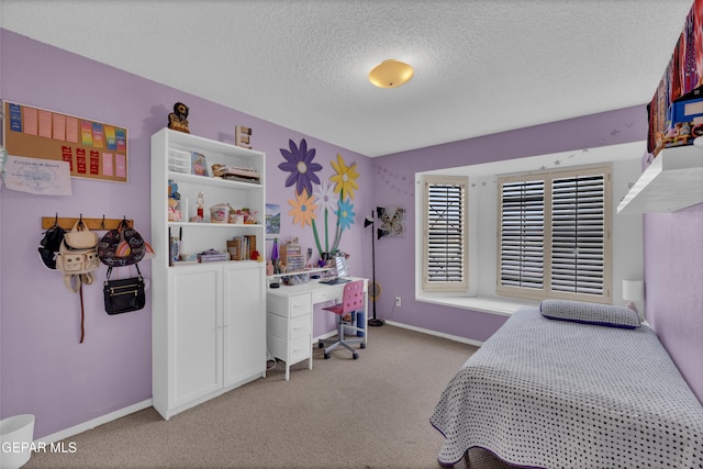 6101 Via Suerte Ave, El Paso, TX 79912 - bedroom featuring carpet, a textured ceiling, and baseboards