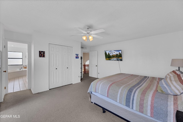 6101 Via Suerte Ave, El Paso, TX 79912 - bedroom with carpet, a closet, and a ceiling fan