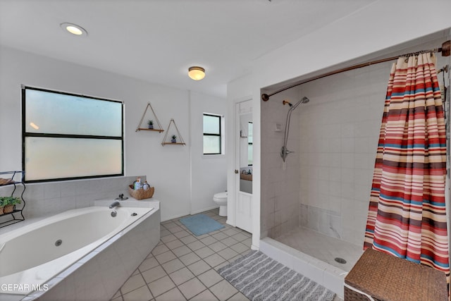 6101 Via Suerte Ave, El Paso, TX 79912 - full bath featuring a tile shower, a tub with jets, toilet, and tile patterned flooring