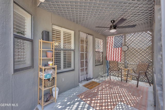 6101 Via Suerte Ave, El Paso, TX 79912 - unfurnished sunroom featuring a ceiling fan