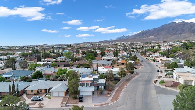 6101 Via Suerte Ave, El Paso, TX 79912 - aerial perspective of suburban area with a mountainous background