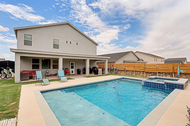 12749 Iron Falls Dr, Horizon City, TX 79928 - view of pool featuring a patio, a pool with connected hot tub, and an outdoor living space