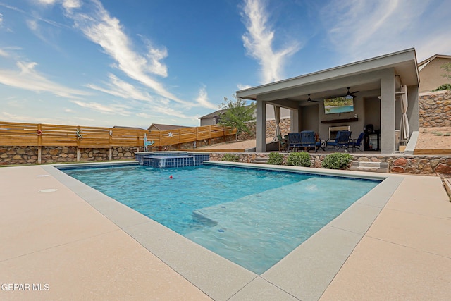 12749 Iron Falls Dr, Horizon City, TX 79928 - view of pool with a ceiling fan, a patio area, a pool with connected hot tub, a fenced backyard, and an outdoor hangout area