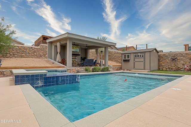 12749 Iron Falls Dr, Horizon City, TX 79928 - view of pool featuring a ceiling fan, a patio area, a fenced backyard, and a pool with connected hot tub