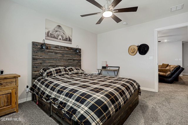12749 Iron Falls Dr, Horizon City, TX 79928 - bedroom with carpet flooring, baseboards, and ceiling fan