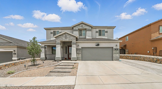12749 Iron Falls Dr, Horizon City, TX 79928 - view of front of house featuring stucco siding, stone siding, an attached garage, and driveway