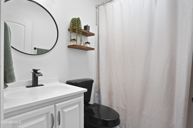 11973 Regal Banner Ln, El Paso, TX 79936 - full bath featuring toilet, vanity, and a shower with curtain