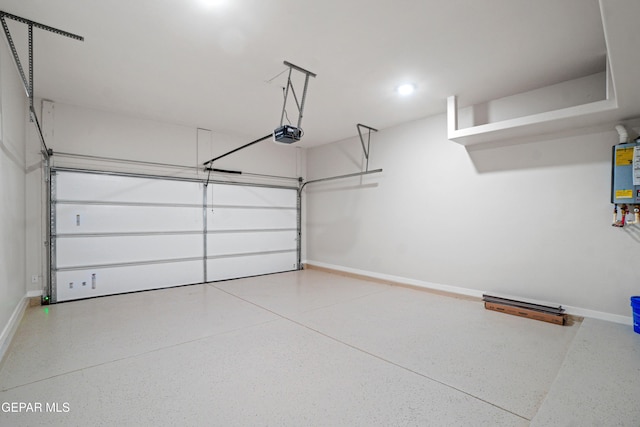13351 Jeff Winton Dr, El Paso, TX 79928 - garage featuring baseboards, a garage door opener, recessed lighting, and water heater