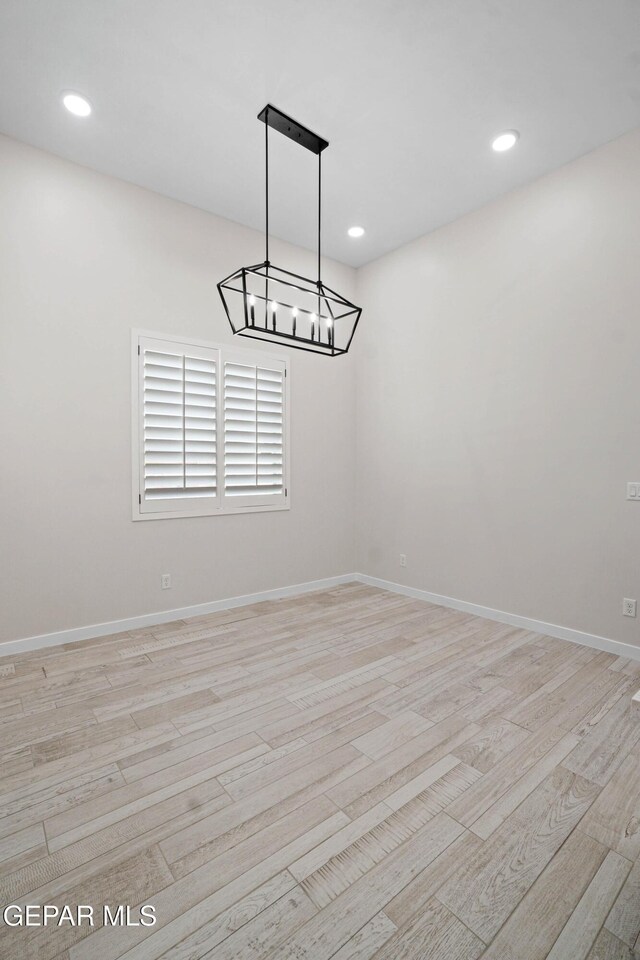 13351 Jeff Winton Dr, El Paso, TX 79928 - unfurnished room featuring light wood-type flooring, a chandelier, baseboards, and recessed lighting