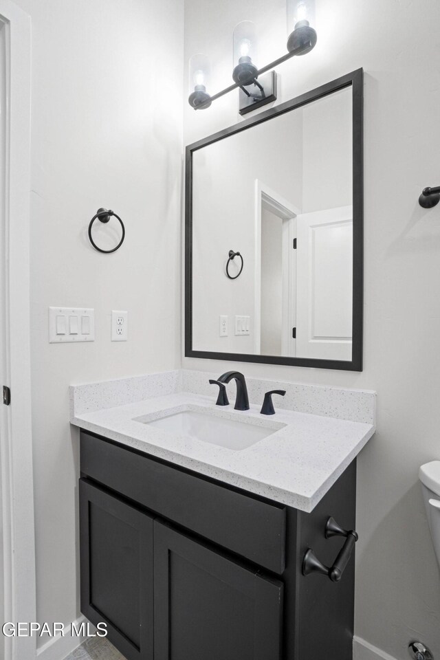 13351 Jeff Winton Dr, El Paso, TX 79928 - half bath with vanity and toilet
