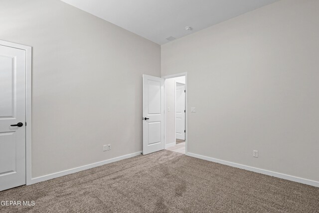 13351 Jeff Winton Dr, El Paso, TX 79928 - spare room featuring carpet and baseboards