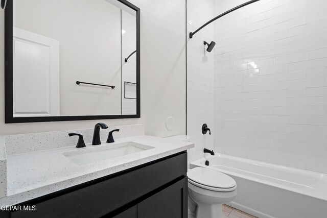 13351 Jeff Winton Dr, El Paso, TX 79928 - bathroom featuring toilet, vanity, and tub / shower combination