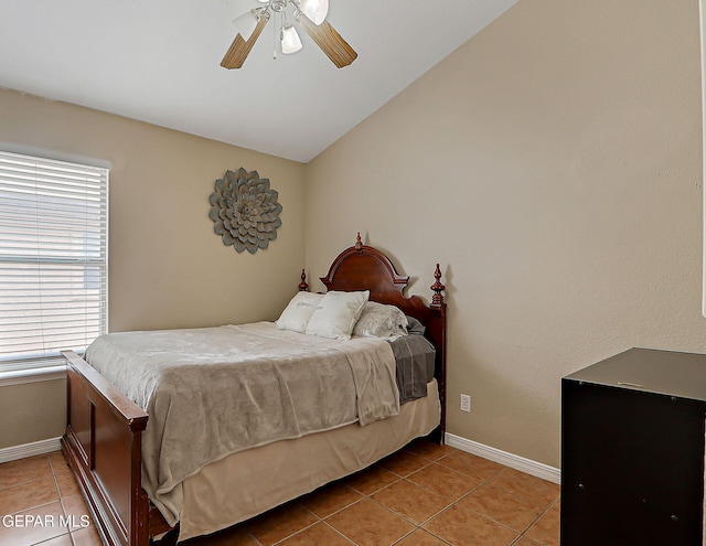 11840 Balladeer Ave, El Paso, TX 79936 - tiled bedroom featuring baseboards, vaulted ceiling, and ceiling fan