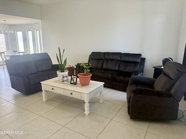 13862 Paseo Bosque Ave, El Paso, TX 79928 - living area featuring a chandelier and light tile patterned flooring
