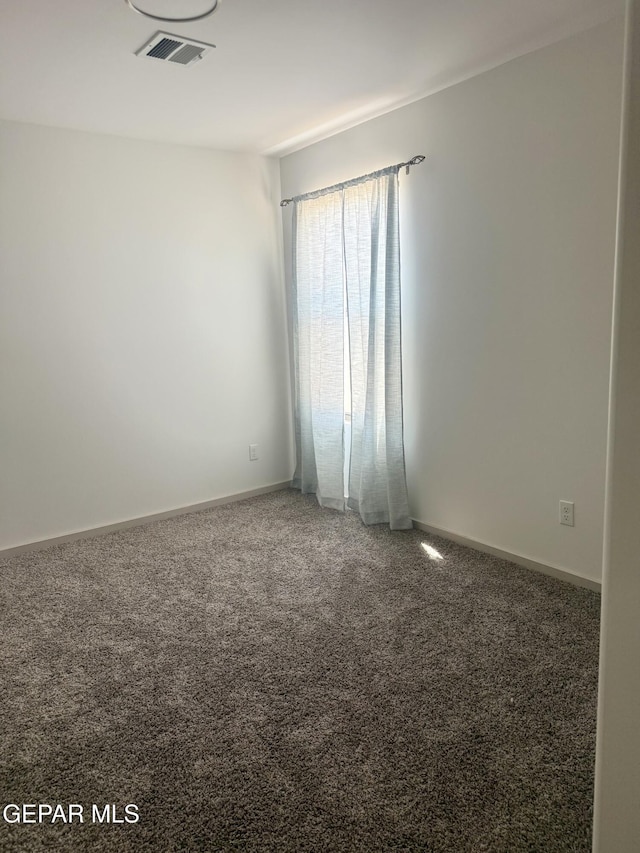 13862 Paseo Bosque Ave, El Paso, TX 79928 - carpeted empty room with baseboards
