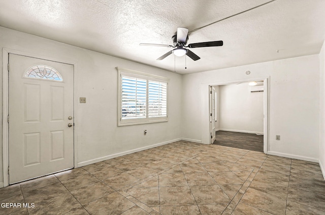 264 Edith Dr, El Paso, TX 79915 - foyer entrance featuring plenty of natural light, a ceiling fan, a textured ceiling, and tile patterned flooring