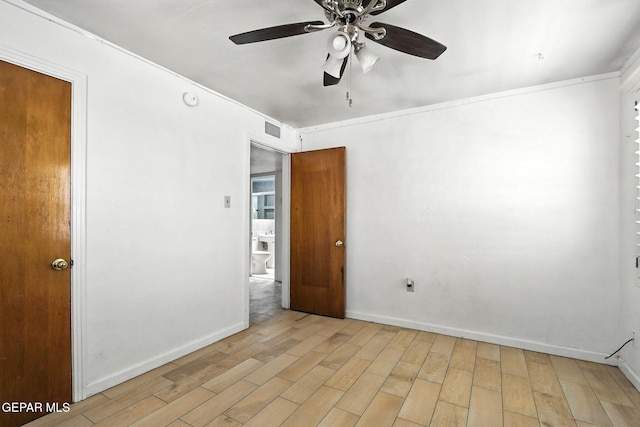 264 Edith Dr, El Paso, TX 79915 - spare room featuring light wood-type flooring, a ceiling fan, a smoke detector, and ornamental molding