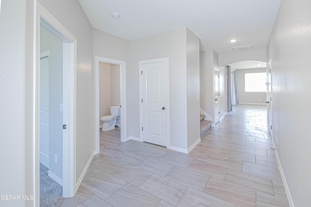 14737 Tierra Escape Ave, El Paso, TX 79938 - hall with arched walkways and stairway