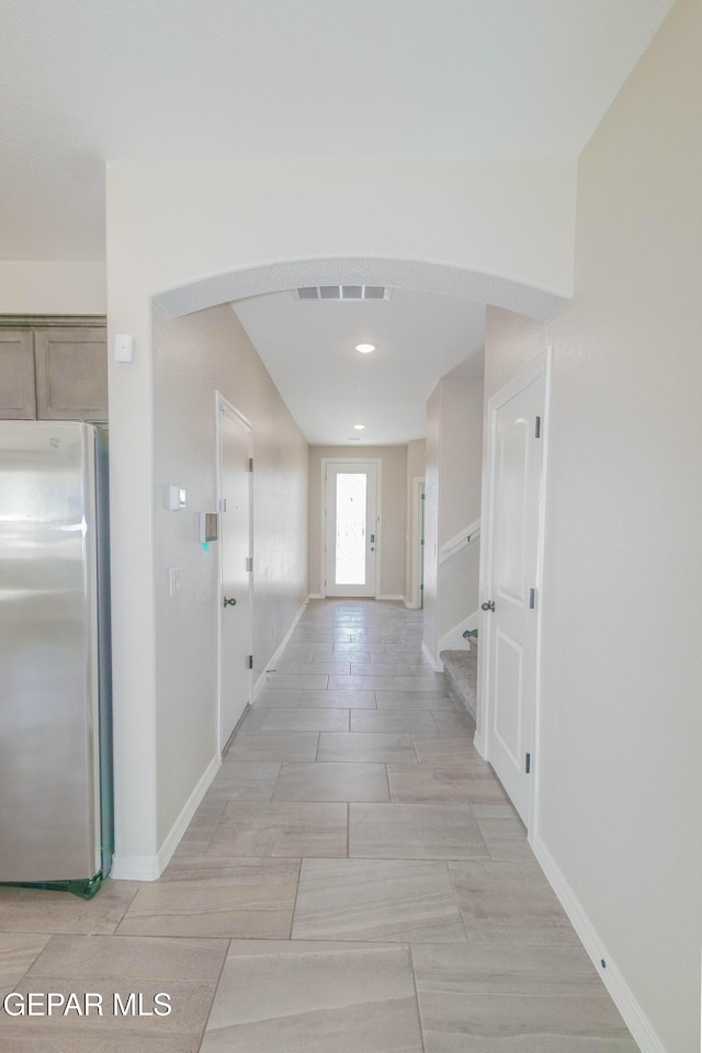 14737 Tierra Escape Ave, El Paso, TX 79938 - hall featuring arched walkways, stairs, and recessed lighting