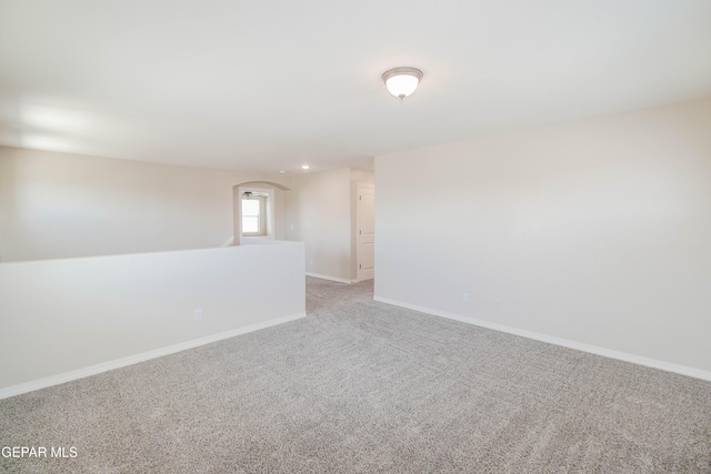 14737 Tierra Escape Ave, El Paso, TX 79938 - spare room with carpet, recessed lighting, and arched walkways