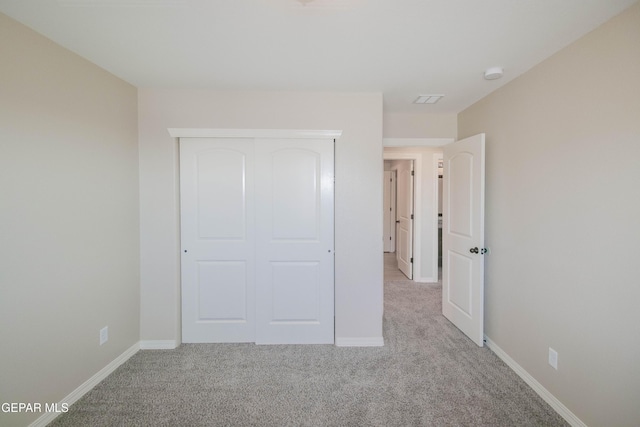 14737 Tierra Escape Ave, El Paso, TX 79938 - unfurnished bedroom featuring carpet floors and a closet