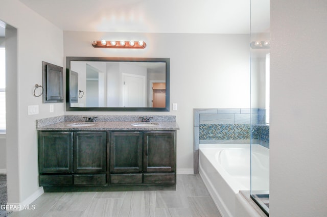 14737 Tierra Escape Ave, El Paso, TX 79938 - full bathroom with a bath and double vanity