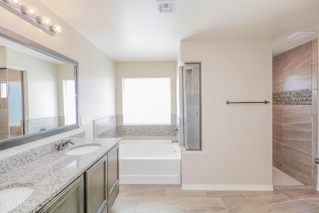 14737 Tierra Escape Ave, El Paso, TX 79938 - full bathroom featuring a bath, double vanity, walk in shower, and tile patterned flooring