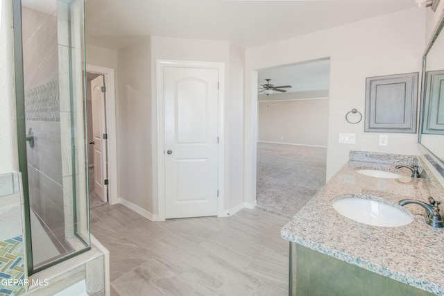 14737 Tierra Escape Ave, El Paso, TX 79938 - full bathroom featuring a shower stall, double vanity, and ceiling fan