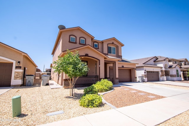 12320 Desert Path Ct, El Paso, TX 79938 - mediterranean / spanish-style home featuring stucco siding, concrete driveway, and an attached garage