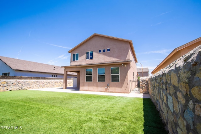 12320 Desert Path Ct, El Paso, TX 79938 - rear view of house featuring stucco siding, a patio, and a gate