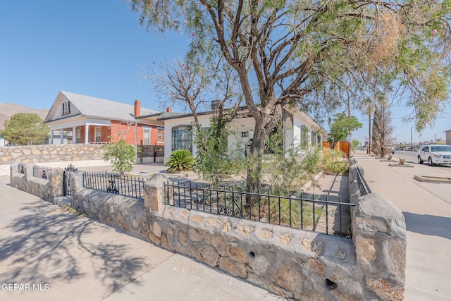 3427 Hamilton Ave, El Paso, TX 79930 - view of front of home featuring a fenced front yard and stucco siding