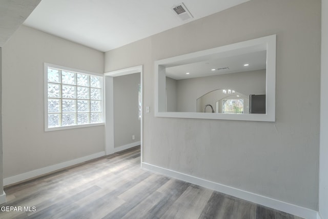 3427 Hamilton Ave, El Paso, TX 79930 - spare room with baseboards and wood finished floors