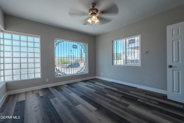 3427 Hamilton Ave, El Paso, TX 79930 - spare room with baseboards, a ceiling fan, and dark wood finished floors
