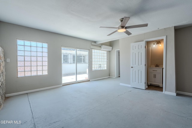 3427 Hamilton Ave, El Paso, TX 79930 - unfurnished bedroom featuring access to exterior, connected bathroom, concrete flooring, baseboards, and ceiling fan