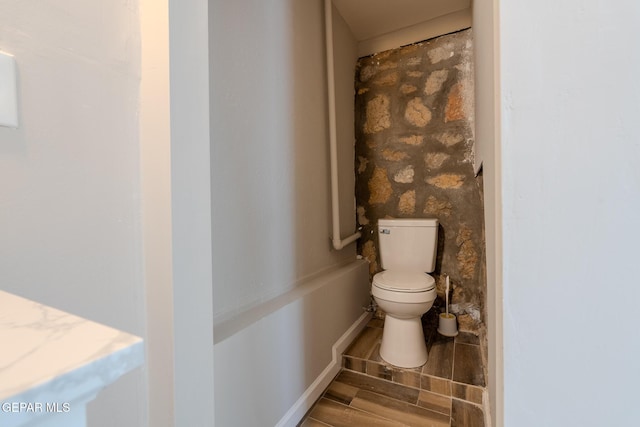 3427 Hamilton Ave, El Paso, TX 79930 - bathroom with toilet and wood finished floors