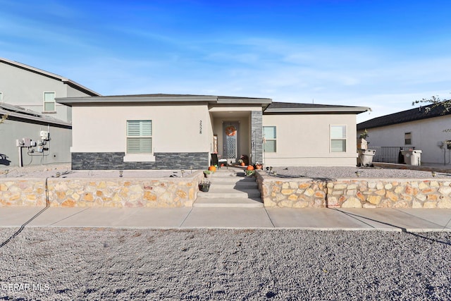 2528 Mike Price Dr, El Paso, TX 79938 - view of front of home featuring stucco siding and stone siding