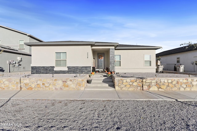 2528 Mike Price Dr, El Paso, TX 79938 - view of front of house featuring stucco siding and stone siding