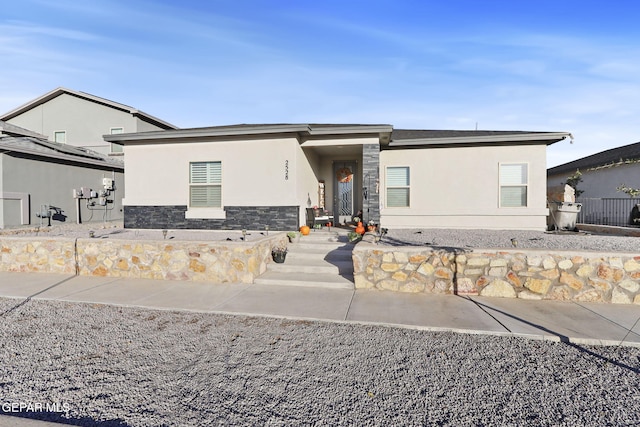 2528 Mike Price Dr, El Paso, TX 79938 - view of front of home featuring stone siding and stucco siding