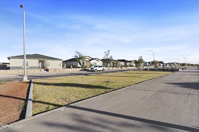 2528 Mike Price Dr, El Paso, TX 79938 - view of front of house with a residential view and a front lawn